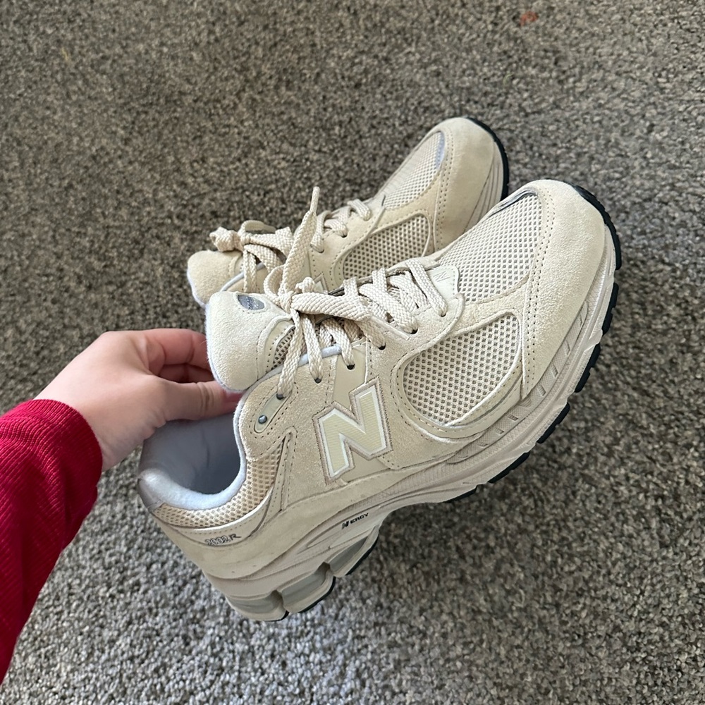 New Balance 2002r cream and silver sneakers